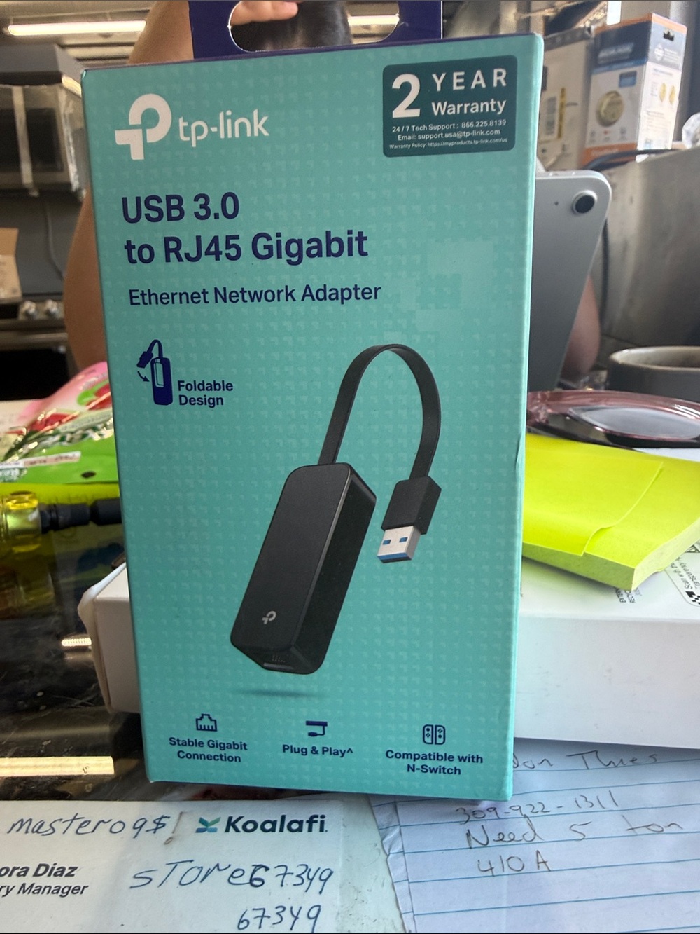 TP-Link USB 3.0 to RJ45 Gigabit Adapter in black and teal packaging